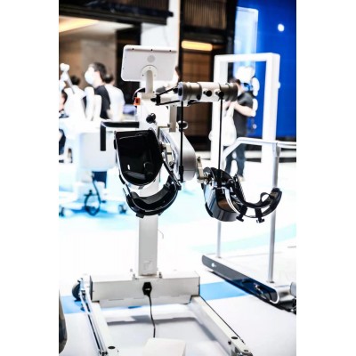 Bedside upper and lower limb training robot